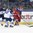 POPRAD, SLOVAKIA - APRIL 22: Russia's Dmitri Samorukov #5 carries the puck while Finland's Rasmus Kupari #34 and Miro Heiskanen #33 look on during semifinal round action at the 2017 IIHF Ice Hockey U18 World Championship. (Photo by Andrea Cardin/HHOF-IIHF Images)